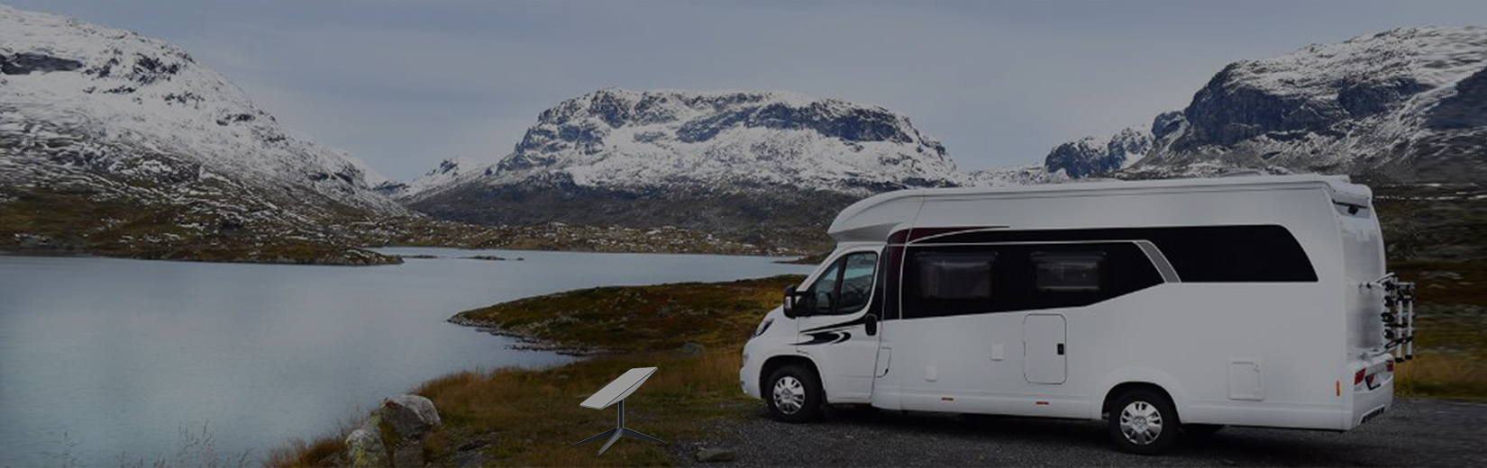 Starlink antenna at the base of a recreational vehicle