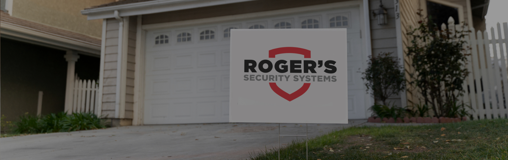 Sahw Rogers Home Security sign in front of esidential home